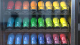 Colored cans in vending machine