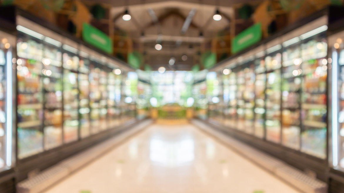 supermarket grocery store aisle and shelves blurred background